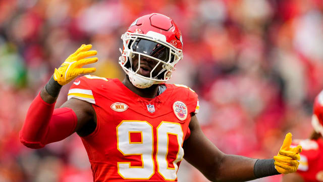 Dec 25, 2023; Kansas City, Missouri, USA; Kansas City Chiefs defensive end Charles Omenihu (90) rallies the crowd during the second half against the Las Vegas Raiders at GEHA Field at Arrowhead Stadium. Mandatory Credit: Jay Biggerstaff-USA TODAY Sports  